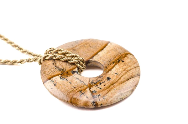 Picture jasper donut on golden chain — Stock Photo, Image