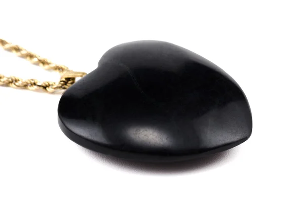 Black agate heart with golden chain — Stock Photo, Image