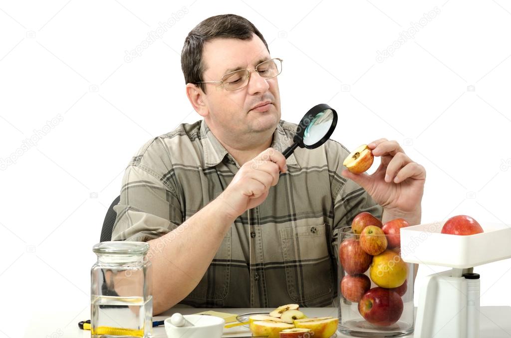 Phytocontrol engineer stares at the rotten apple