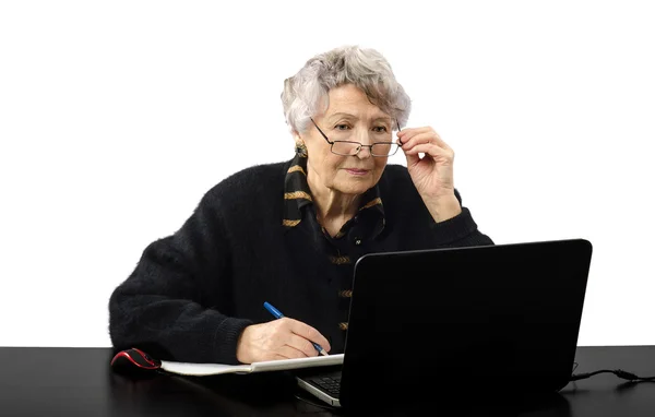 Old teacher listening to the student during online lesson — Stock Photo, Image