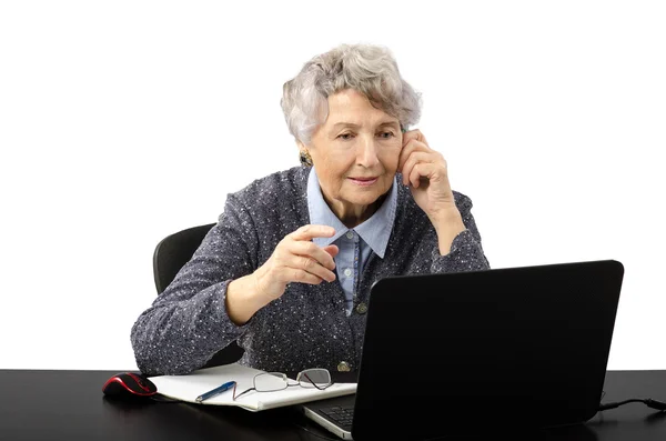 Old grey haired teacher having online lesson by skype — Stock Photo, Image