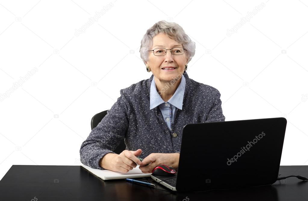 Grey haired old lady talking in skype