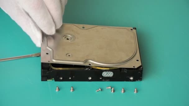 Somebody shows deep dents on the hard disk — Stock Video