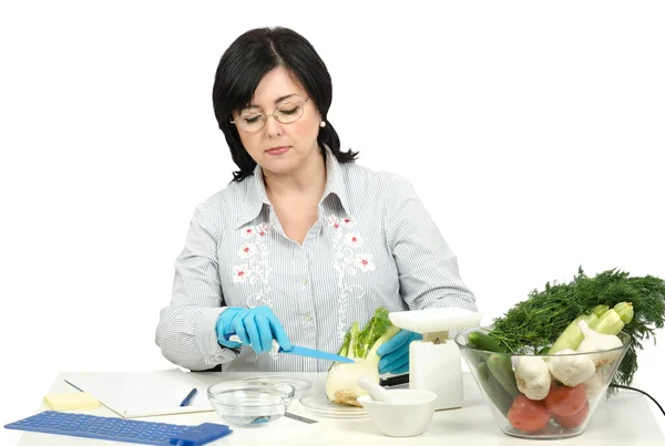 Phytocontrol technician intending to cut a fennel — Stock Photo, Image