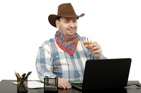 Cowboy praten met vrienden op skype — Stockfoto