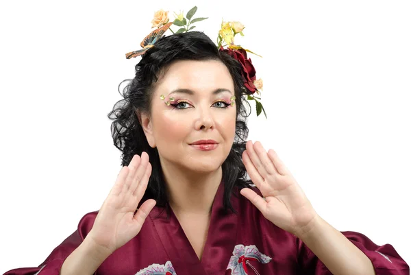 Portrait of the curly kimono woman with flowers in her hair — Stock Photo, Image