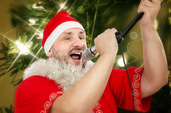 Fat Santa belting Jingle Bells — Stock Photo, Image