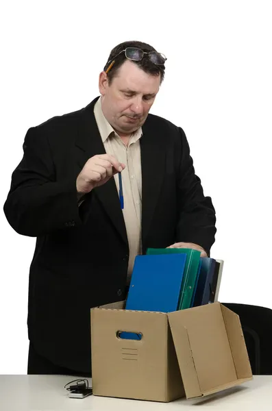 Fired mature man finishing pack a cardboard box — Stock Photo, Image