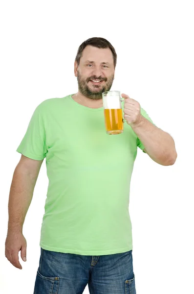 Man holding light beer tankard with left hand — Stock Photo, Image