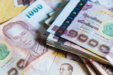 Tayland banknotunun arka planı 1000 baht üst görünüm iş konsepti