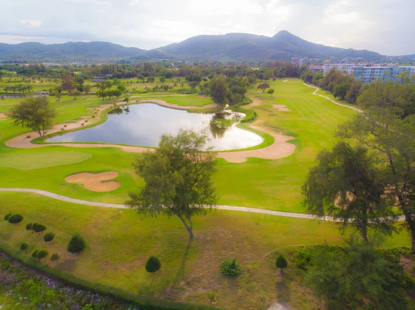 Green meadow golf course sport background aerial view