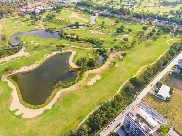 Green meadow golf course sport background aerial view