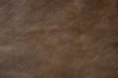 Kahverengi, tam tahıllı, gerçek deri arka plan inek derisi.