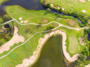 Aerial view green grass golf course field with river sport club