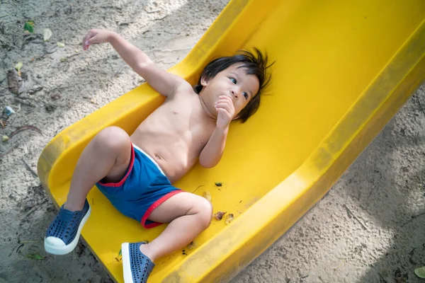 Little Boy Playing Playground Park Enjoying Slider Outdoor Recreation — Stock Photo, Image