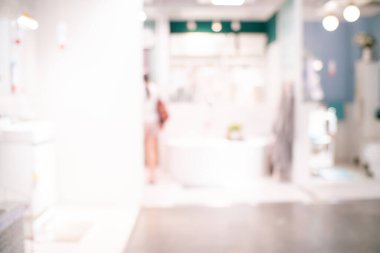 Bokeh iş geçmişine sahip soyut bulanık market rafı