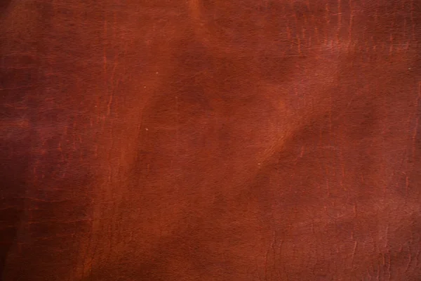 Luxury vintage red brown genuine cow vegetable tanned leather abstract background
