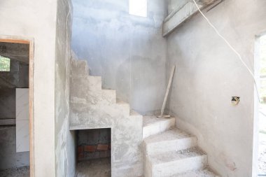 Cement ladder interior building of modern house construction site