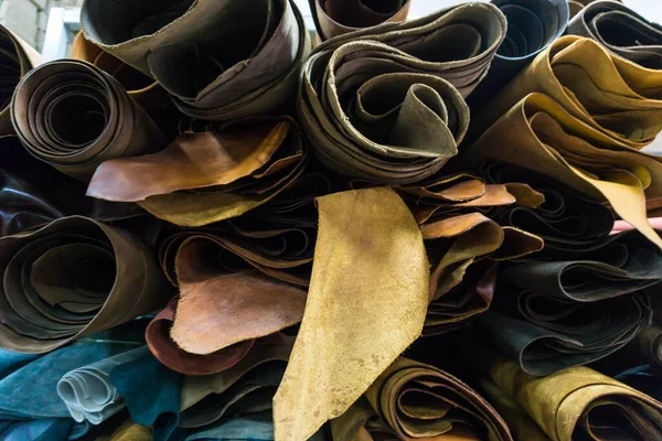 Raw cow vegetable tanned leather sheet crafts in shop, Craftsmanship object