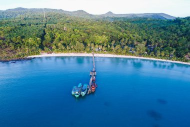 Exotic sea beach island turquoise water with tropical green tree forest aerial view