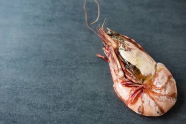 Prawn sea shrimp grilled on black plate top view