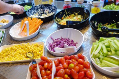 Fresh colorful vegetable and cereal on salad bar in restaurant healthy food