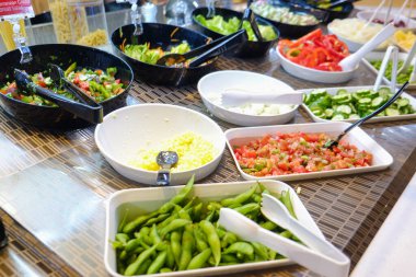 Fresh colorful vegetable and cereal on salad bar in restaurant healthy food
