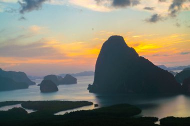 Mountain sunrise on mangrove forest sea bay sky cloud sightseeing travel in Phangnga Thailand