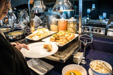 People hand grab buffet food seminar in hotel food and drink business