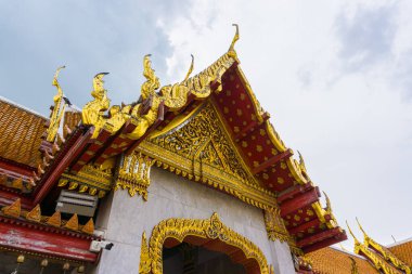 Golden pagoda of marble busshist temple sightseeing in Bangkok city travel Thailand