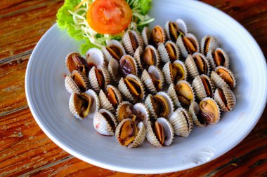 Boiled ark shell seafood serve in Thailand restaurant close up