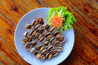Boiled ark shell seafood serve in Thailand restaurant close up