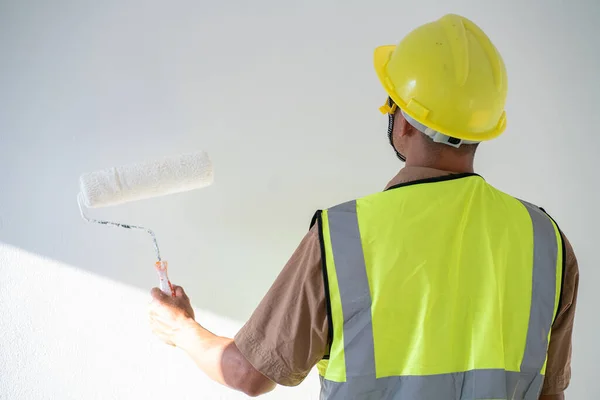 Men Paint Indoor Color Roller Paint White Background — Zdjęcie stockowe