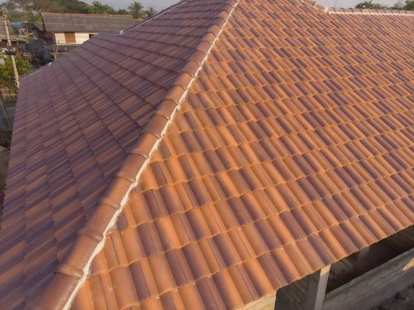 Orange brown new house roof texture in rural village real estate industry