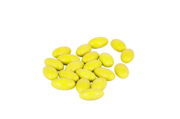 Група жовтих таблеток крупним планом — стокове фото