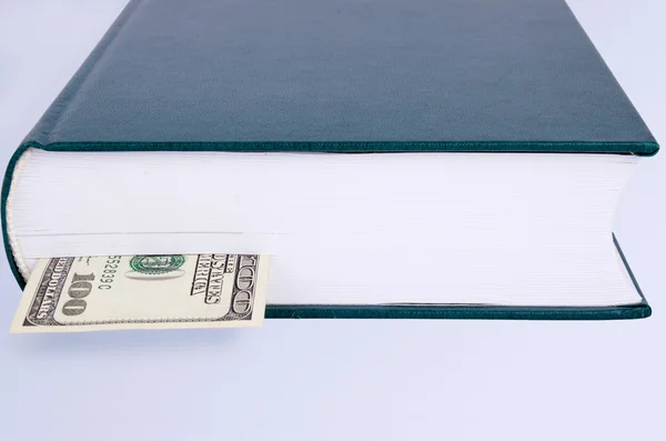 Closed green book with a bookmark 100 USD — Stock Photo, Image