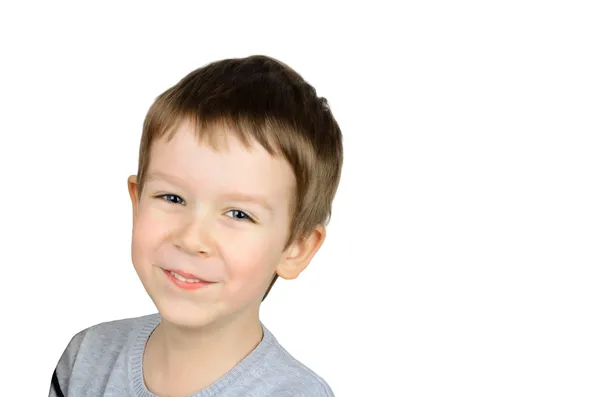 Radostný chlapec v šedý svetr — Stock fotografie