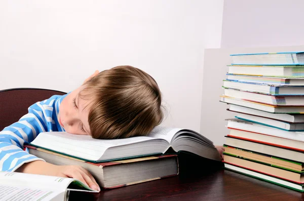 Little boy sleeping on books — Stock Photo, Image