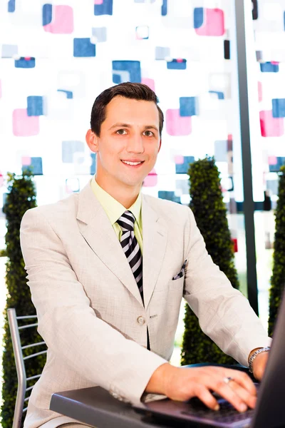 Businessman working on his laptop — Stock Photo, Image