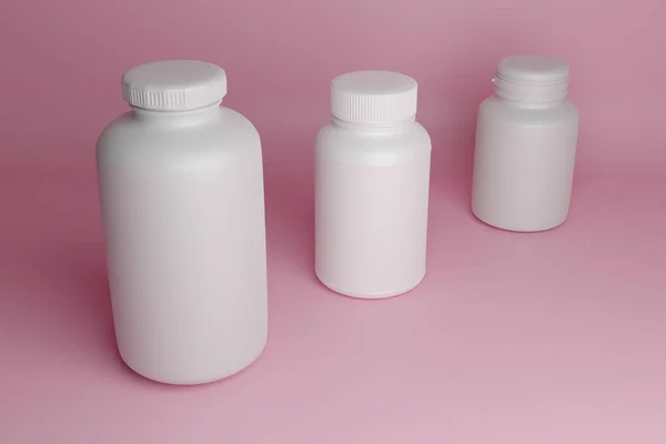Burkar För Vitaminer Och Kosttillskott Tre Vita Slutna Plastburkar Rosa — Stockfoto