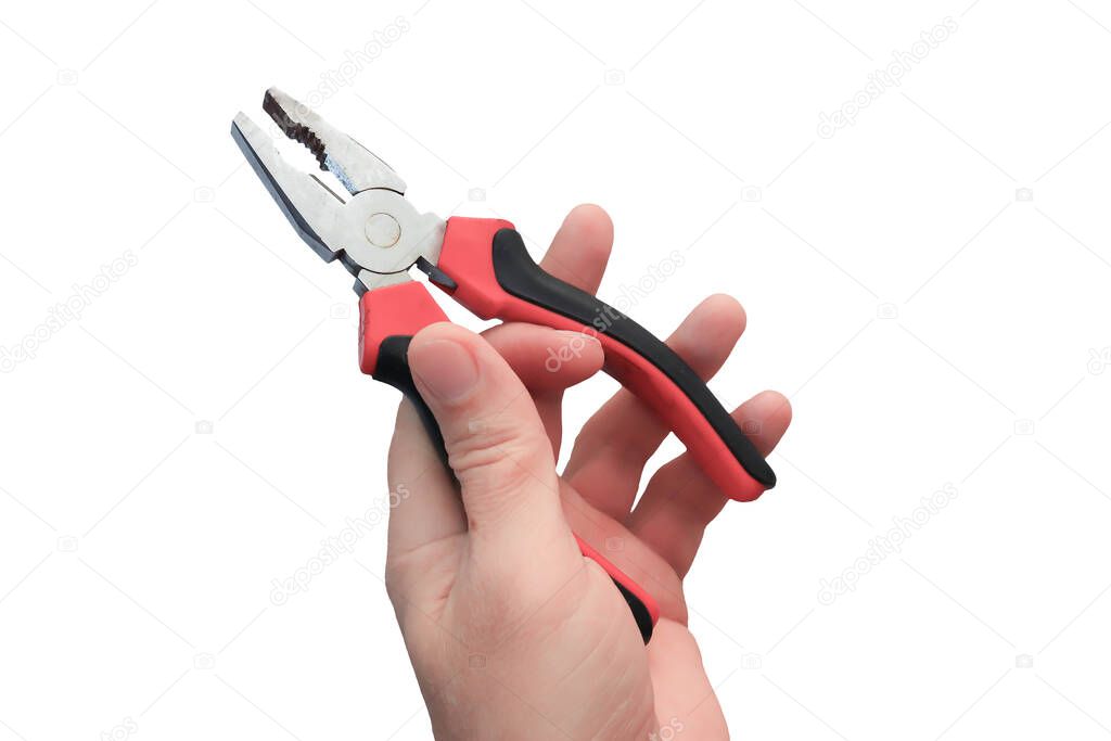 Master's hand with close-up pliers. Trade winds with insulated plastic handles. Isolate on a white background.