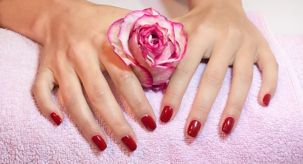 Woman hands with red manicure — Stock Photo, Image