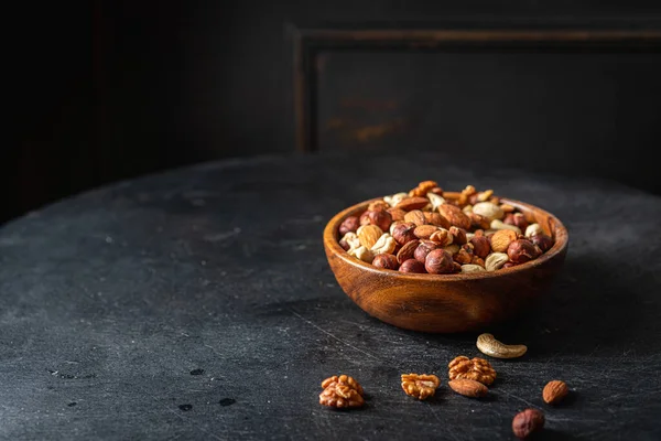 Mixed nuts in a bowl — Stock Photo, Image