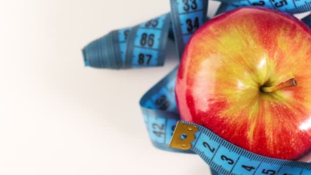 Apple Rotates Centimeter Tape Concept Healthy Eating Dieting Weight Loss — Video