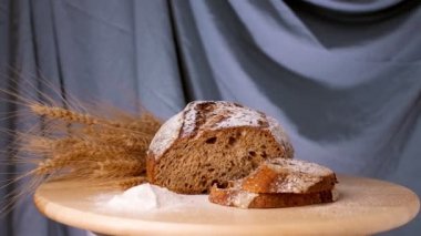 Warm Fresh Bread in a Bakery Rotation. Making Bread and Eco Production. Manufacturing Process Working Hard