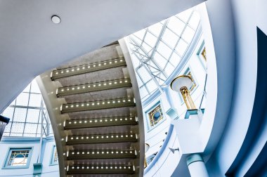 Staircase and large glass dome in Towson Town Center, Maryland. clipart