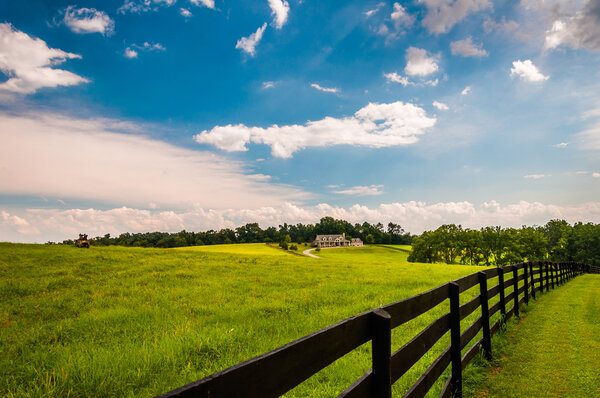 Beautiful summer sky over fence and estate in Southern York Coun