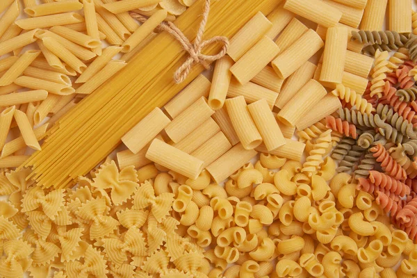 Pasta Concept Various Types Dry Pasta Being Sorted Five Groups — Stock Photo, Image