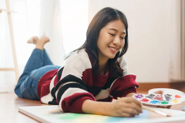 Art Concept Asian Female Artist Lying Floor Using Paint Brush — Stock Photo, Image