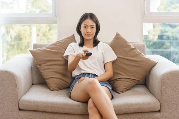 Home Lifestyle Concept Young Woman Sit Couch Hold Remote Switch — Stock Photo, Image